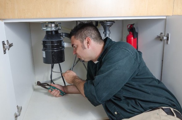 How to Unclog a Garbage Disposal with Standing Water